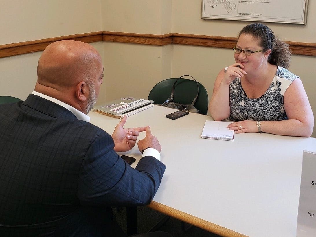 Senator Rausch meets with a constituent at her Sherborn office hours last June. 