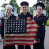 Herndon students wearing original USS Herndon uniforms.