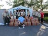 In front is manager of RSM Cares Food Pantry Chris O'Connor 
