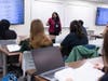 Harper College Instructor Ranjani Murali engages with their English class. Murali regularly uses memes to enhance interactions with their students, a creative approach that flourished during their time as a Diverse Faculty Fellow at the college.