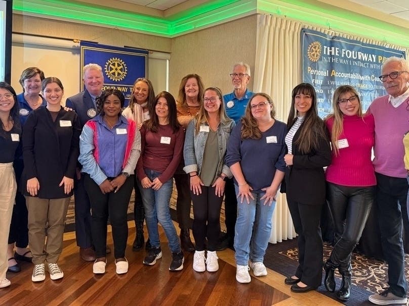 Harper Alumna Mariana Alcantara Gonzales (second from right) is one of the nearly 100 recipients of the Rotary Club of Schaumburg-Hoffman Estates Fishing Well Scholarship, which supports Harper College students age 24 and older.
