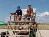 Lifeguards on duty watch over swimmers at Brick Beach 3.