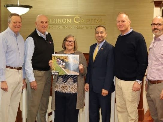 Left to right: Kent Rohrer, Habitat Board President; Kevin Jackson, Gridiron Capital; Thomas Saadi, State Commisioner for Veterans Affiairs; Fran Normann, Executive Director, Housatonic Habitat; Tom Burger, Gridiron; Ed Francis, Gridiron