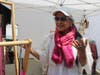 Paula Herrera talks about scarves she made for Quriandino Company at Artisan Market in Winnetka on Saturday May 30, 2026.