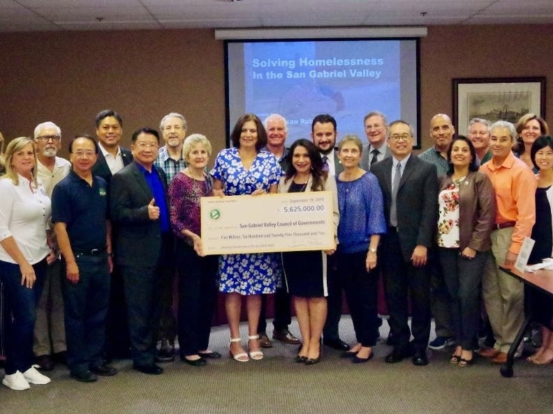 Senator Rubio presenting ceremonial check to members of the San Gabriel Valley Council of Governments. 