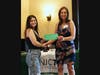 Madelyn accepting her award from NJCTS Fiscal and Human Resource Director, Santina Reichenbach.