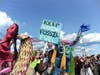 Mermaids for climate change. The Mermaid Parade on Boardwalk in Coney Island, Saturday, June 22, 2019. 