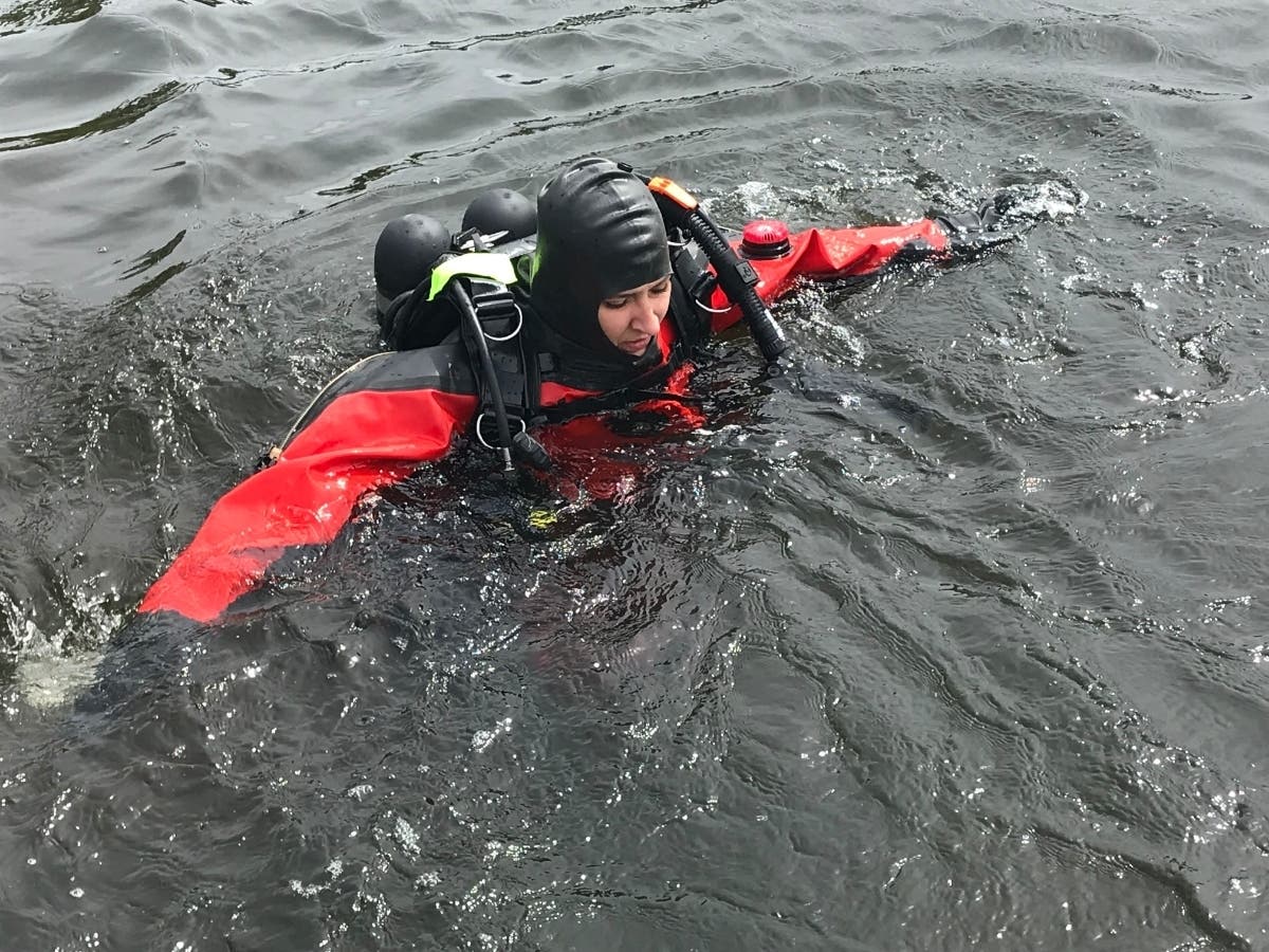 Wauconda Fire Department r​escue diver Hannah Rocco treads water in Bangs Lake. 