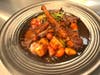 Lambchops smothered with potatoes. Eggs your way.