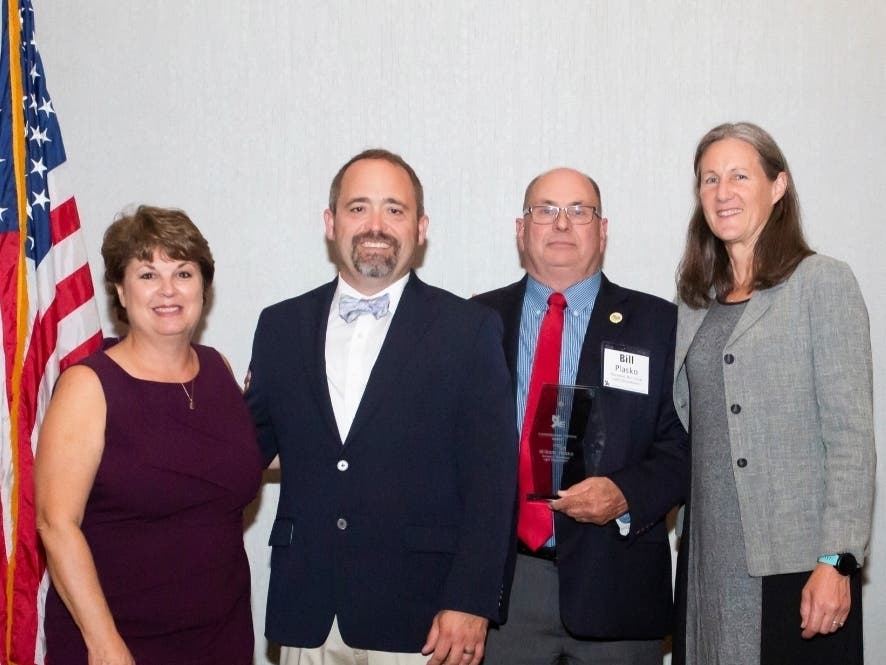 Selectman Bill Plasko (third from left) received an award from the Northeast Public Power Association recently. He has served for over 25 years as a Norwood Light Commissioner and was instrumental in the creation of Norwood Broadband. 