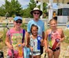 Ed Hoban, chairperson of the Ocean City Fishing Club's Boys and Girls Surf Fishing Tournament, meets with Kaelyn Sheenan, first place (center), Allie Darmohray, second (right), and Hope Mallon, third. 