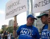 Dr. Michael Herts, left, said the march united people from different walks of life to oppose antisemitism.