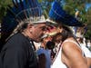 Descendants of Tainos, an indigenous group of the Caribbean, dances. Jorge Baracutei Estevez, left, leads Higuayagua Taino of the Caribbean, Inc. a non-profit preserving the culture of Tainos. Nana Tureiyari Vargas, right, is also a member.