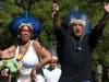 Descendants of Tainos, an indigenous group of the Caribbean, dances. Jorge Baracutei Estevez, right, leads Higuayagua Taino of the Caribbean, Inc. a non-profit preserving the culture of Tainos. Nana Tureiyari Vargas, left, is also a member.