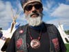 A Taino member of Redrum Motorcycle Club poses for the camera. The club includes members of indigenous heritage and is a patron of indigenous peoples' rights.