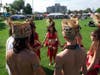 A Tahitian dance team prepares to perform. The group is part of Te Ao Mana, an organization that teaches Polynesian culture through dance, workshops and other events.