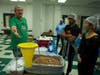Ted Swartwood, regional manager for New York and New Jersey for the Outreach Program, explained and demonstrated to the volunteers the tasks in each assembly line.