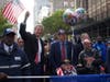 New York City mayor Bill de Blasio (center left) marched on the parade alongside a World War II veteran.