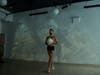 Ahmad Joudeh performed his dance routine, “Sacrifice,” a combination of modern dance and Sufi dance to the crowd. A projector played images of war-torn Syria on the wall behind Joudeh. 