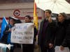 From left to right, Corby Johnson, Dorjee Tseten, Yosef Roth and Nicole Izsak protested outside the building hosting China Conference: US.