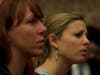Ashlé Dawson, left, and Marisa Mazzeo who danced before the event to pay tribute to victims of human trafficking, listened to human trafficking survivors, Gabrielle Prieto and Beverly Smith speak.