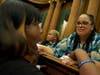 Gabrielle Prieto, a sex trafficking survivor, right, shared her story of struggle and freedom. After her talk, event attendees thanked her for speaking about her experience. 