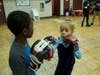 Sayla Font, age 5, right, trains with Carter Davis, age 9, left, in an anti-human trafficking self-defense workshop.