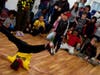 Bboy Quake, left, battled bboy Electric Maddz, age 6, right. Bboy Quake won the beginner level dance tournament.