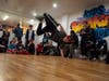 13-year-old Japanese American bboy, Rinto, center, beat bboy Kid Dynamite in the finals of the competition.