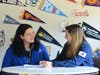 Emily Bray, a School Counselor at CEC, sits with CEC Senior Gabriella Cain in the Counseling Center to discuss college and career planning.