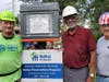 Construction Manager Steve Reinfeldt, homeowner Lonnie Dixon and Dick Perucci from Our Next Mission