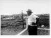 Barton Herr looking out from his deck on Peoria Street, Bloom in the background.
