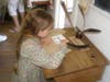 Alice Boissonneau, age seven, from Dighton using a feather ink pen.