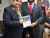 Staff Sgt. John Gonzalez of Post 1711 receives the Liberty Medal from Senator Kevin Thomas