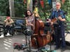 The Band Squeaky Clean entertains families in the Garden at the Manhattan Campus.
