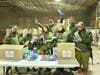 IDF soldiers receiving and unpacking hygiene kits from FIDF.