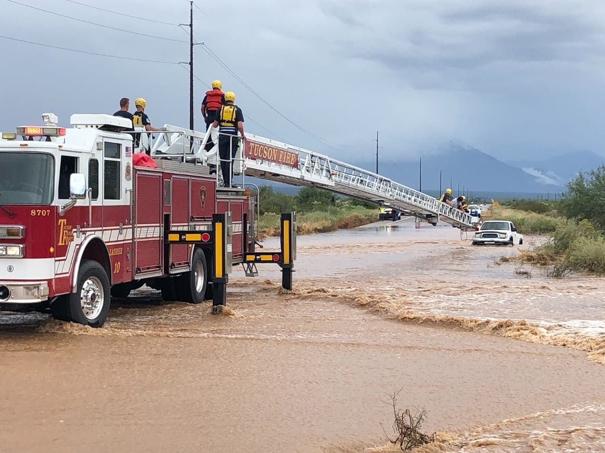 TFD Rescues Driver On Hood, Teen In Wash In Heavy Tucson Rainfall | Tucson,  AZ Patch