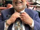 Paula Tracy photo Rep. Paul Berch, D-Westmoreland, adjusts his tie before a legislative hearing in this file photo.