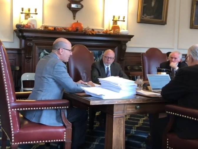 At left, Councilor Russell Prescott, R-Kingston, shares his reasons for not running again at Monday's Executive Council meeting as other councilors look on. Pictured are Councilors Andru Volinsky, Mike Cryans and Ted Gatsas.