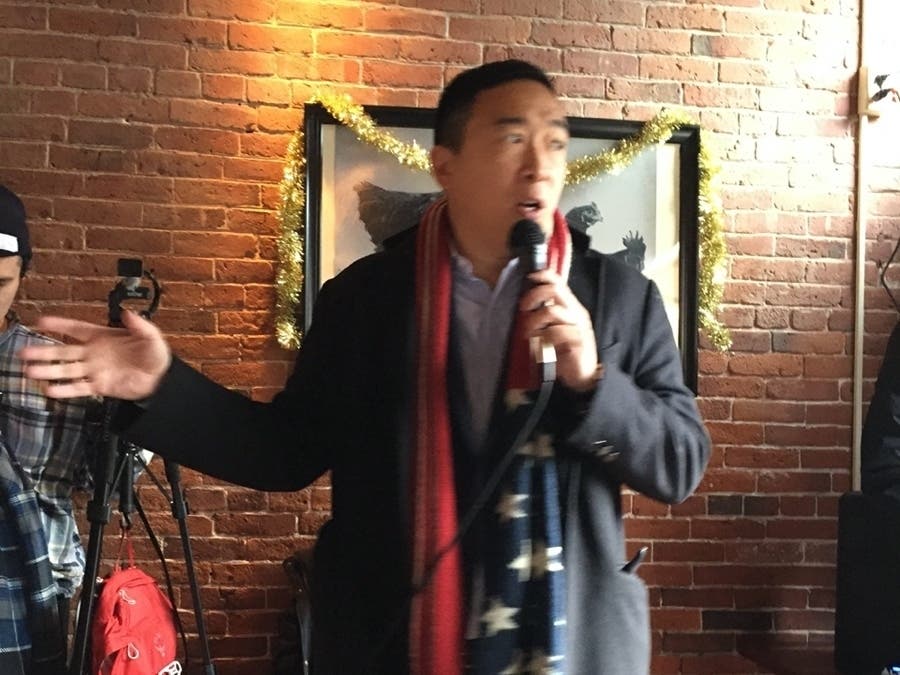 Andrew Yang rallies the crowd at Cure, a trendy restaurant in Portsmouth on Dec. 31, 2019. 
