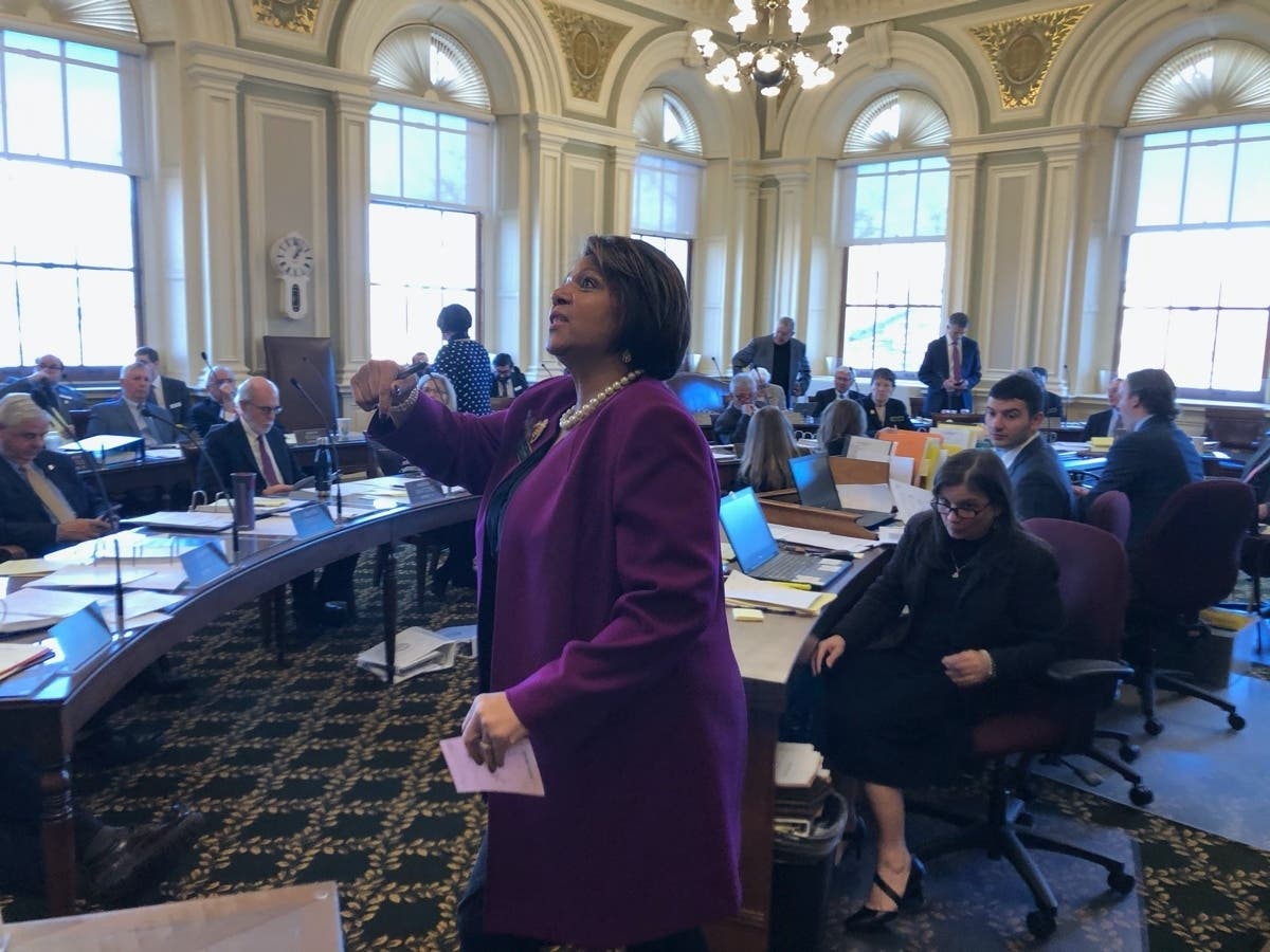 State Sen. Melanie Levesque, D-Brookline, is pictured Jan. 30 motioning to the gallery before the afternoon session.