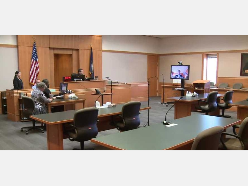 Superior Court Judge David Anderson presides Monday in the lawsuit Democratic legislative leaders filed against Gov. Chris Sununu over spending of federal COVID-19 funds. It was held remotely with court officials present at Hillsborough County Superior Co