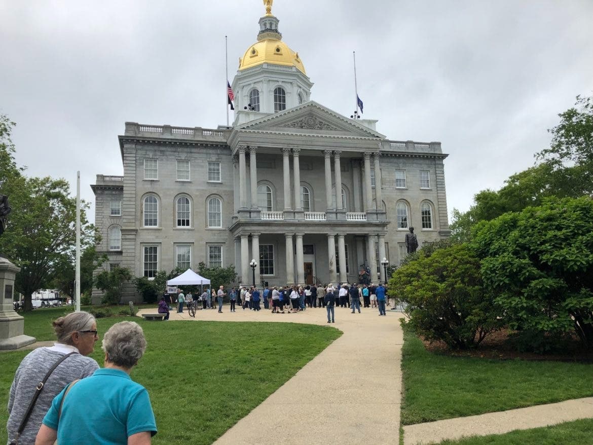 The crowd gathers for the start of the State House Bicentennial celebration in Concord on June 2, 2019.