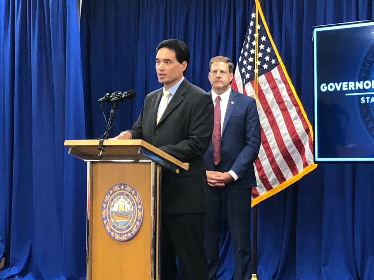 Dr. Benjamin Chan speaks at Tuesday's news conference in Concord with Gov. Chris Sununu behind him.
