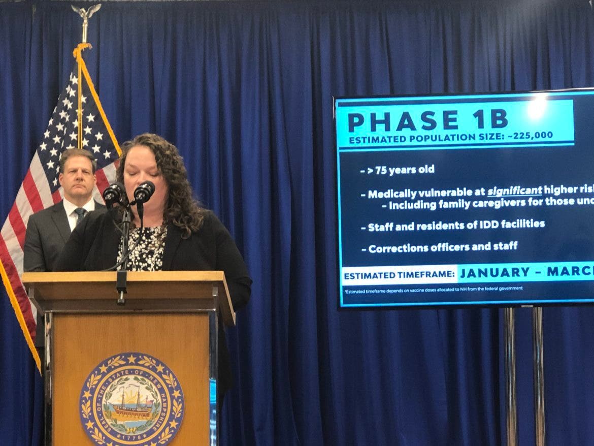 Dr. Beth Daly is pictured with Gov. Chris Sununu behind her at Tuesday's news conference update on COVID-19 in Concord.