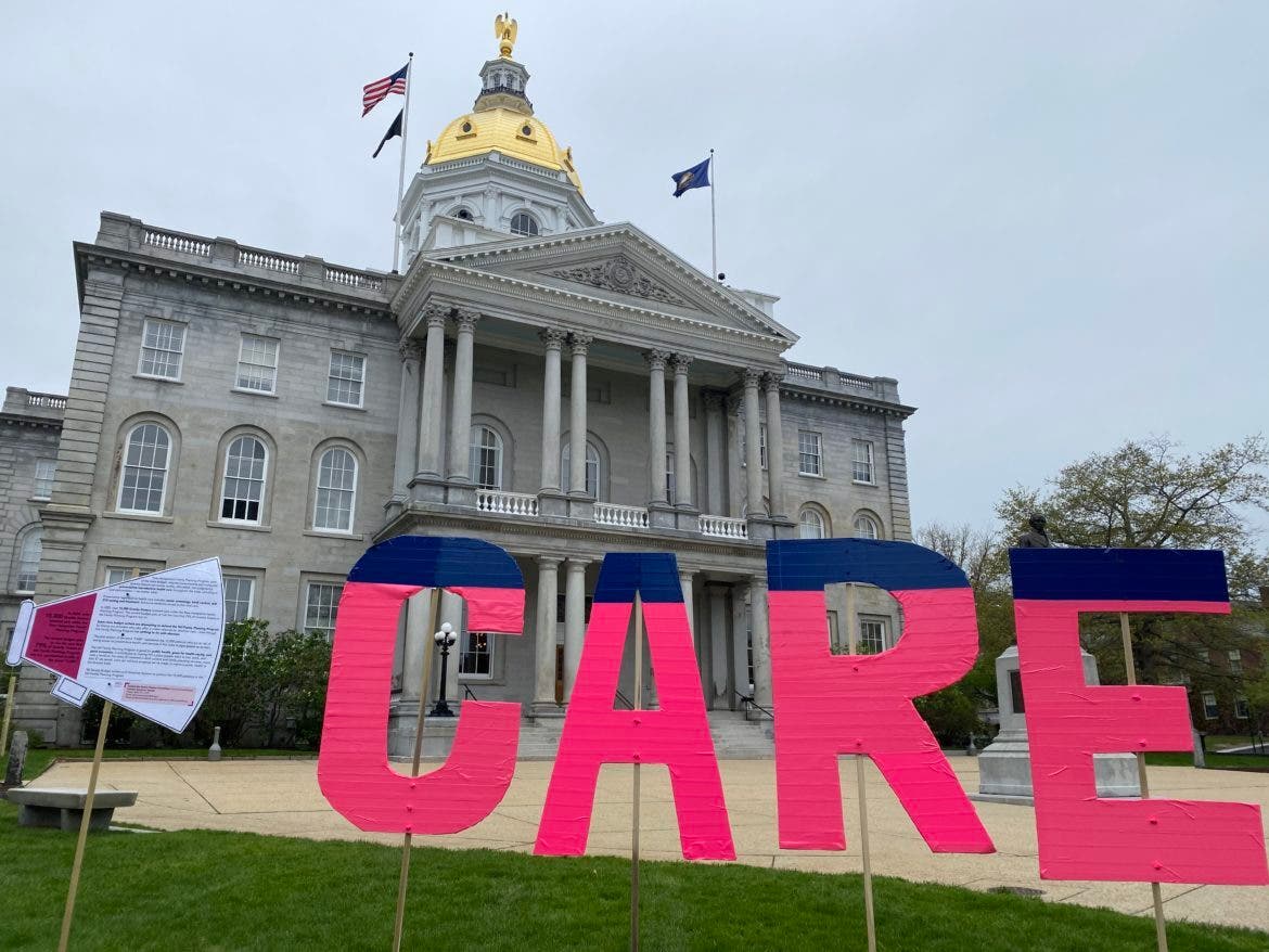 An installation on the Statehouse lawn. The pink inside of each letter represents the 79 percent of patients in the New Hampshire Family Planning Program who received care last year from the reproductive health centers defunded by the state budget.