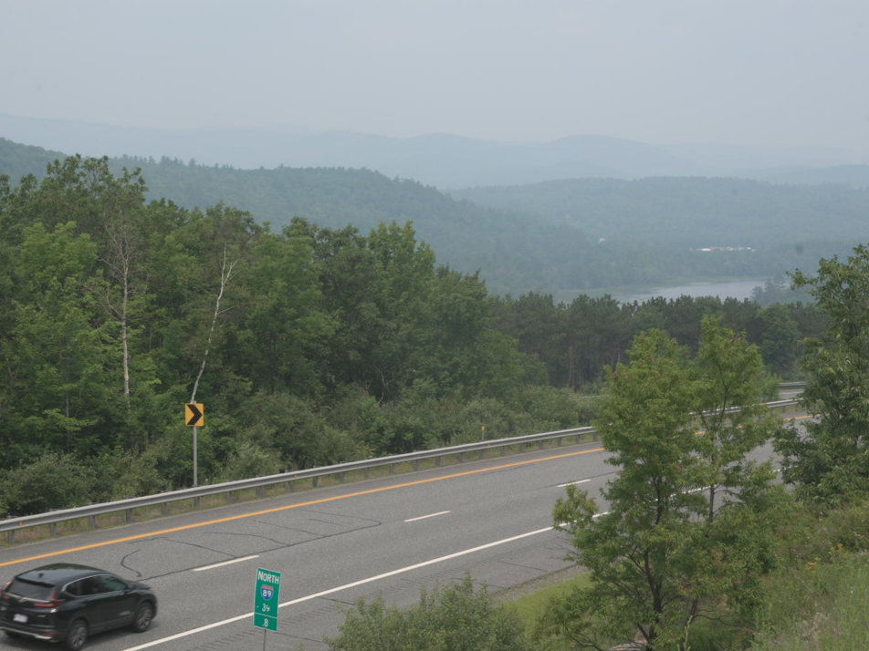 Photos showing the haze from Interstate 89 in Springfield that were taken around noon on Monday. The particle air pollution event is the result of extensive wildfires in central and western Canada and the western United States.