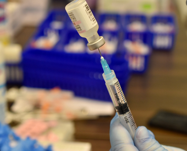 Screen shot of vaccine and syringe