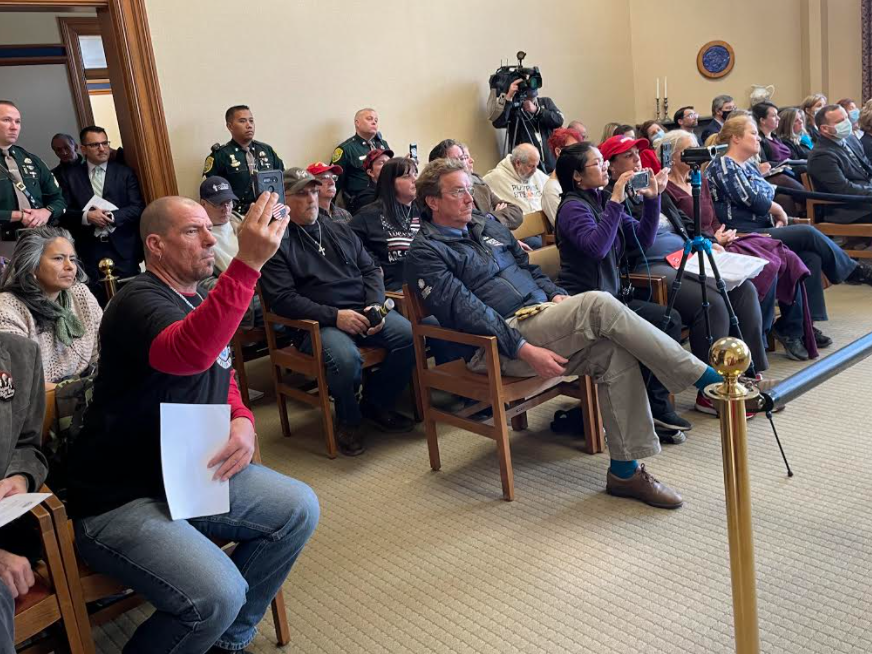 The Joint Legislative Fiscal Committee voted to accept a controversial federal grant to boost vaccines in New Hampshire at the Legislative Office Building Friday where the crowd had to be seated in overflow rooms.