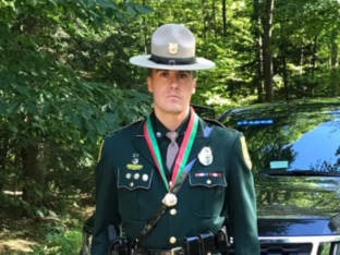 Haden Wilber is pictured when he was still a state trooper receiving a Medal of Meritorious Service in 2019.